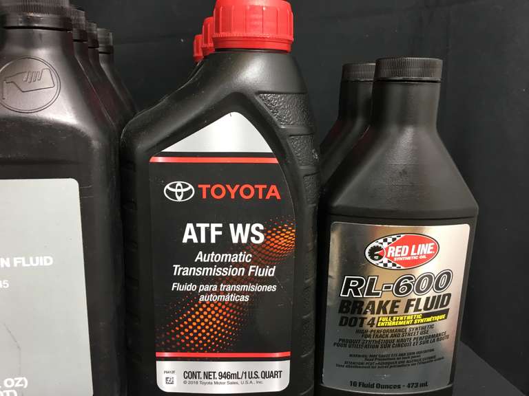 Assortment of Transmission Fluids, Dual Pump Fluid, & Chainsaw
