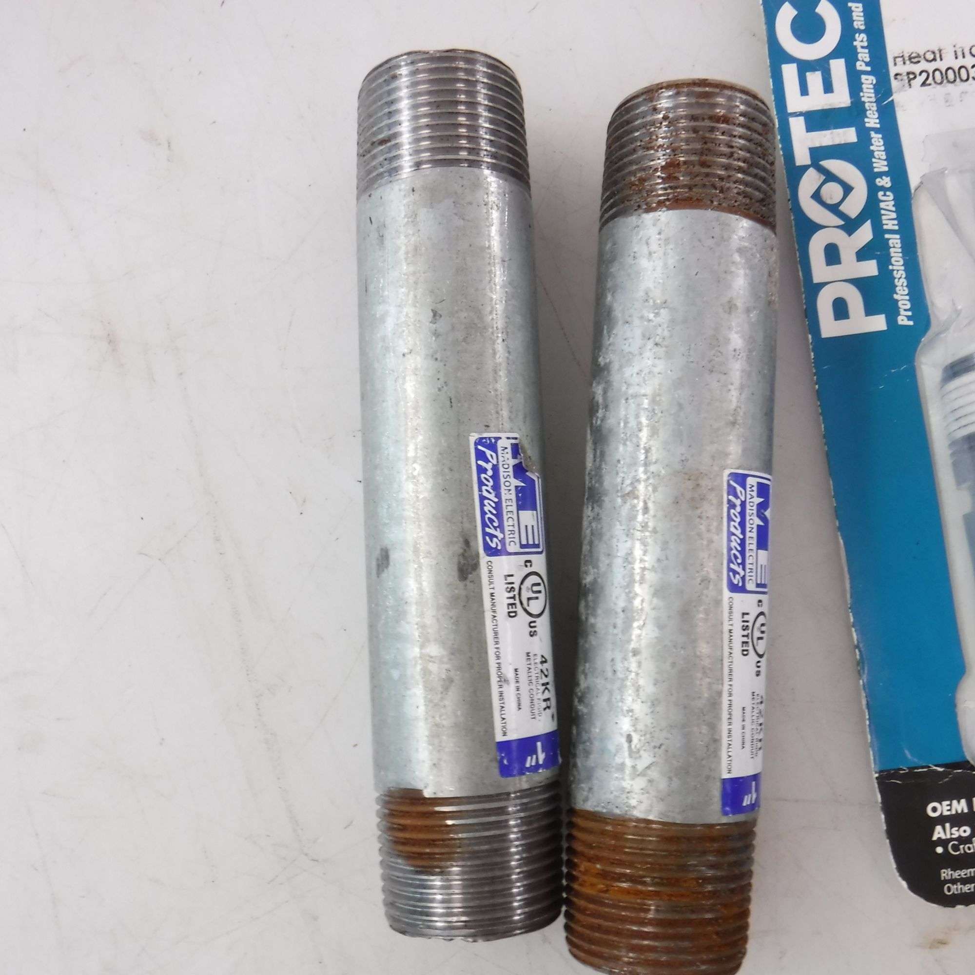 Assortment of Metal Nippel: Rheem Protech Nipple Pair Heat Trap, Madison  Electric 42Kr Electrical Rigid Metallic Conduit - Dutch Goat