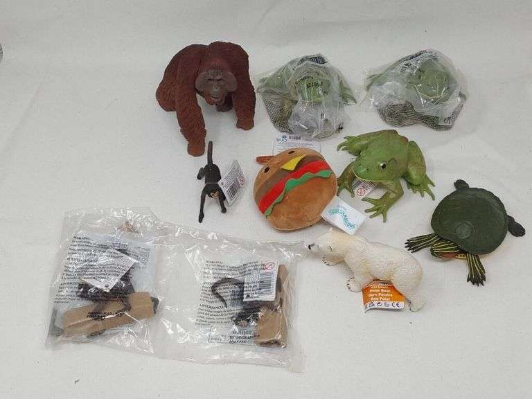 Assortment of 10- Small Toys